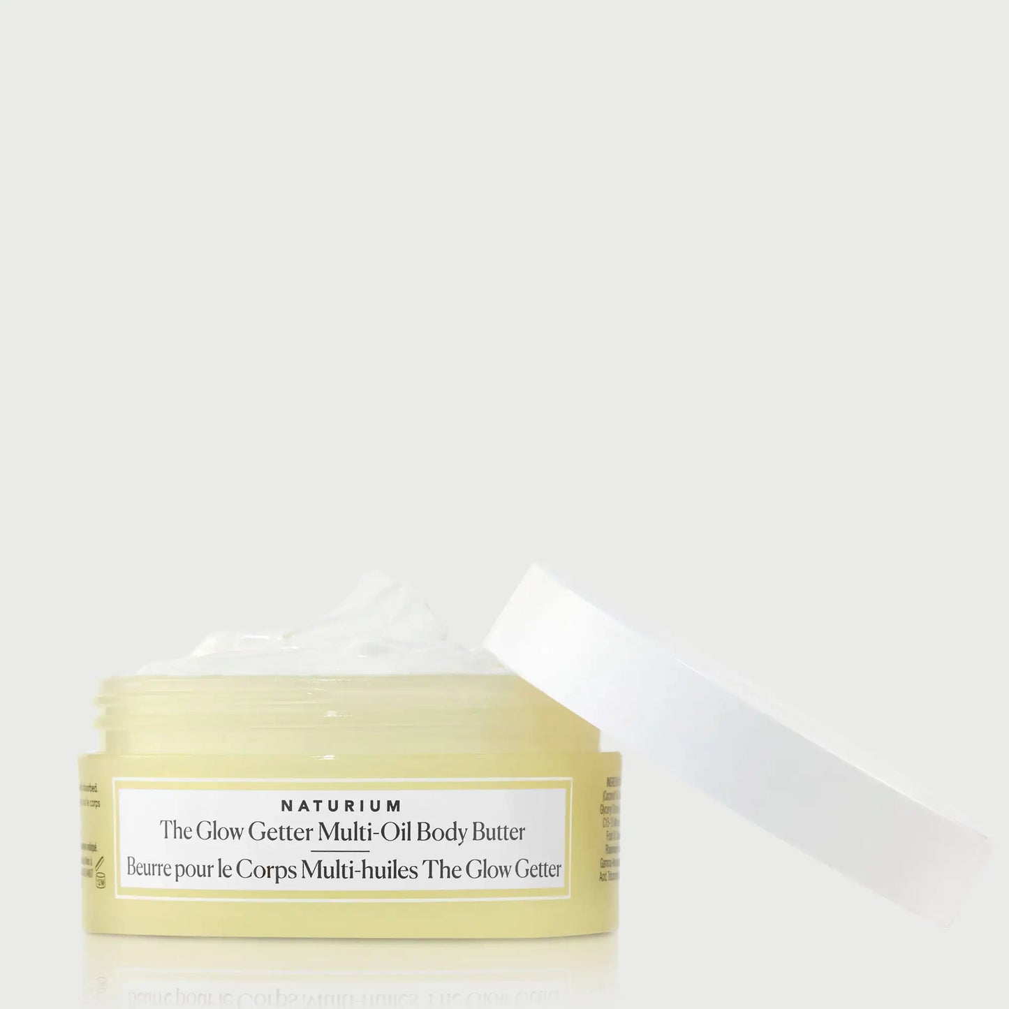 the-glow-getter-multi-oil-body-butter-travel-size-t5 NATR-40115_Glow-Getter-Body-Butter-Mini_front_capoff_bonebkgd.webp