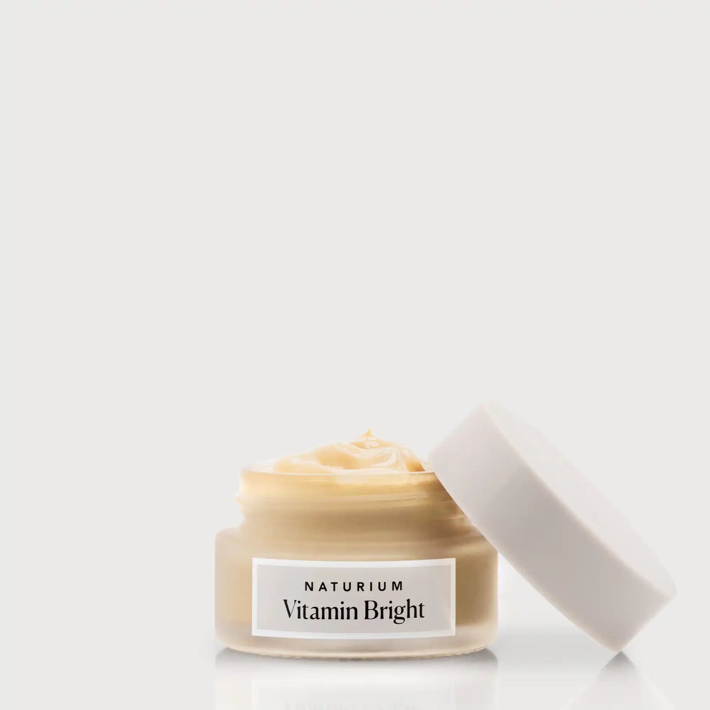 vitamin-bright-illuminating-eye-cream-o3 NATR-VitaminBright_LIGHT_Primary_front_openjar_bone.webp